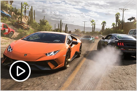 Various cars and trucks racing through desert in Mexico